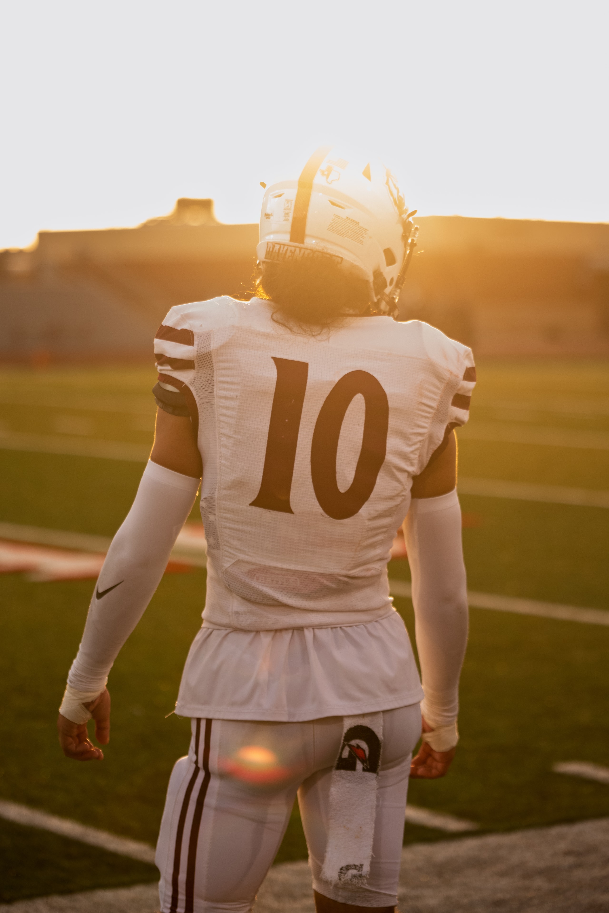 High school football at sunset