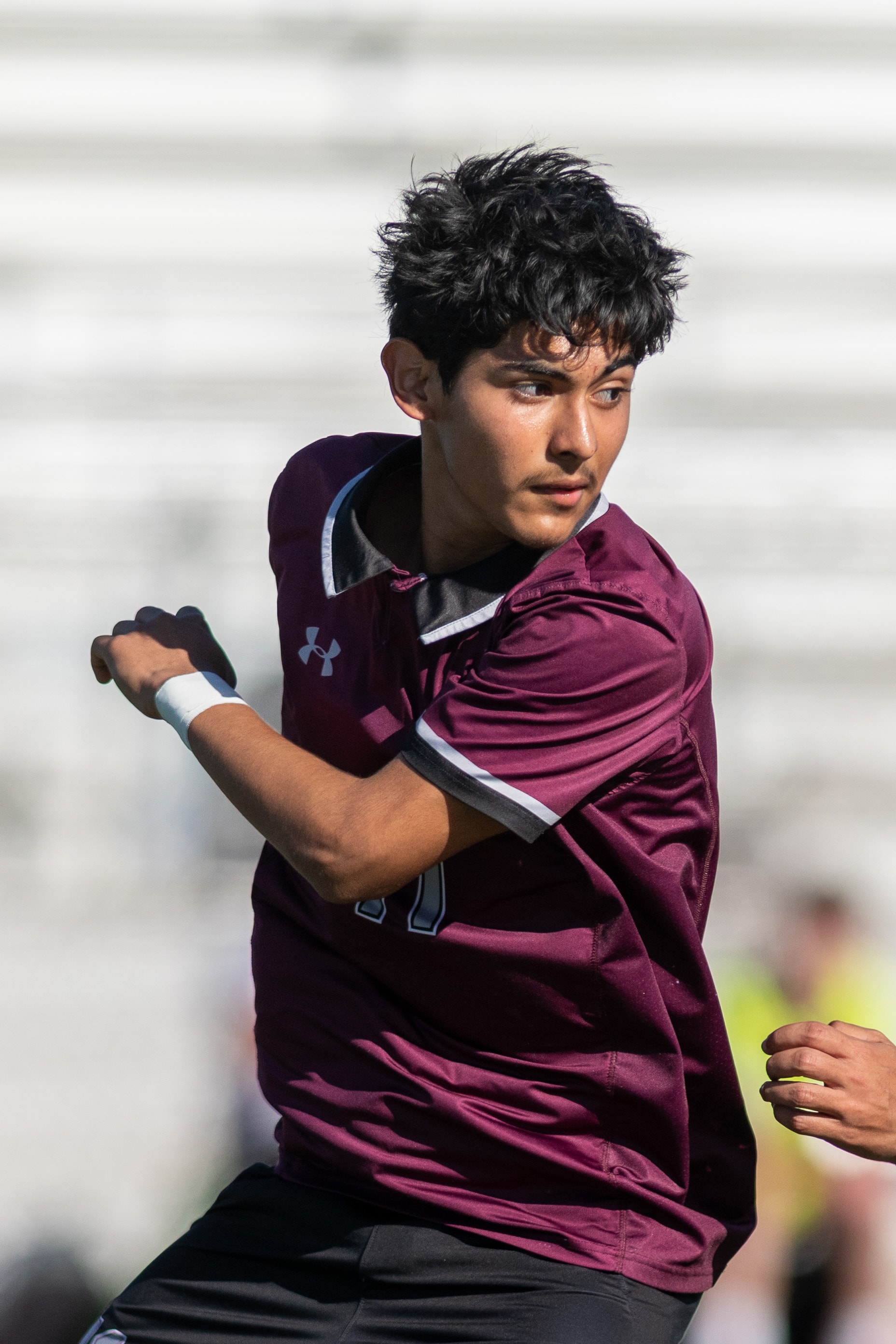 Soccer player #17 in full sprint